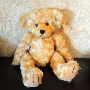 Vintage Russ brand golden bear named Cosgrove is in excellent condition